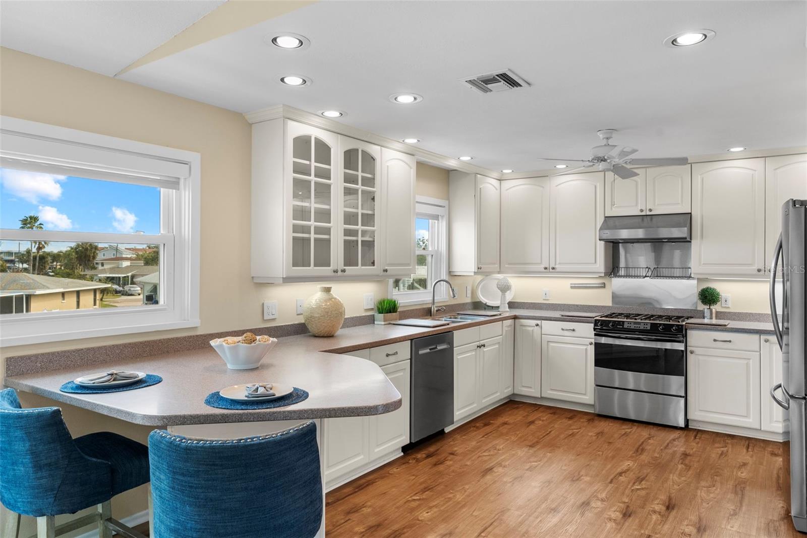 Kitchen with Solid Surface Counter Tops.