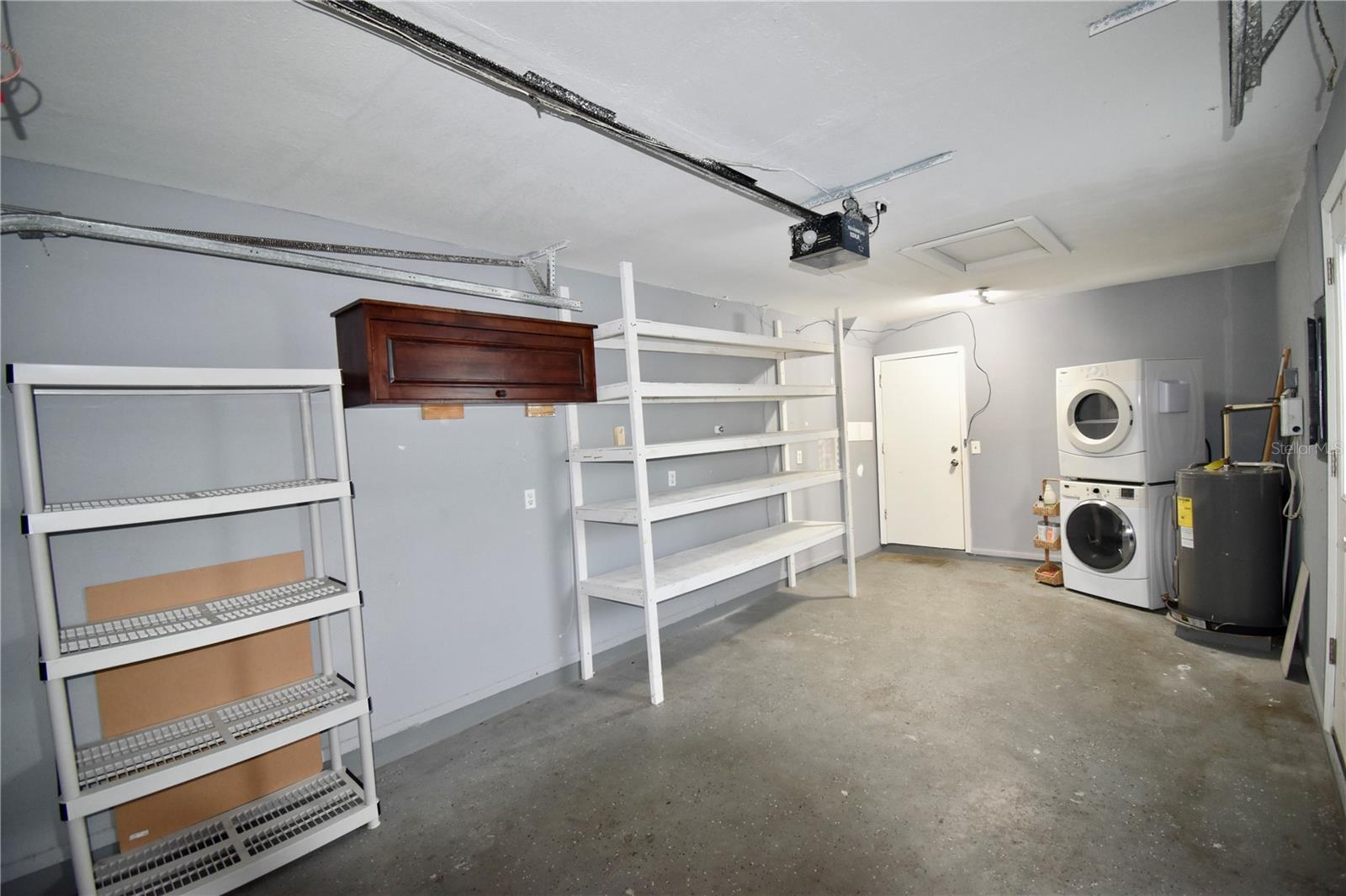 Garage with finished floors and Laundry