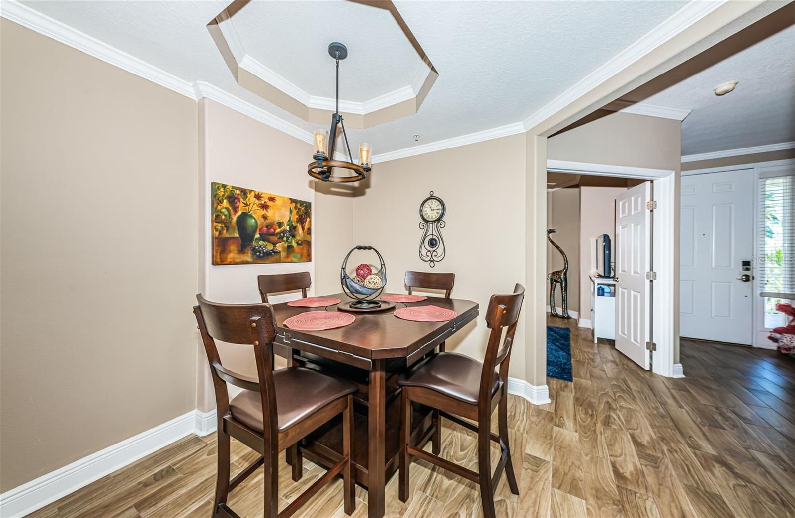 Dinette, through hall leading to Primary bedroom on left to front door
