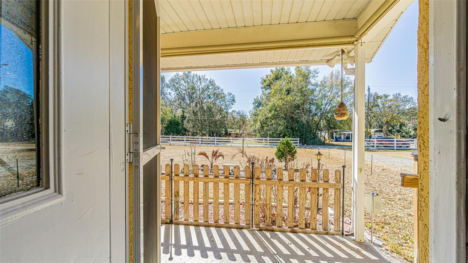 View from porch overlooking front yard