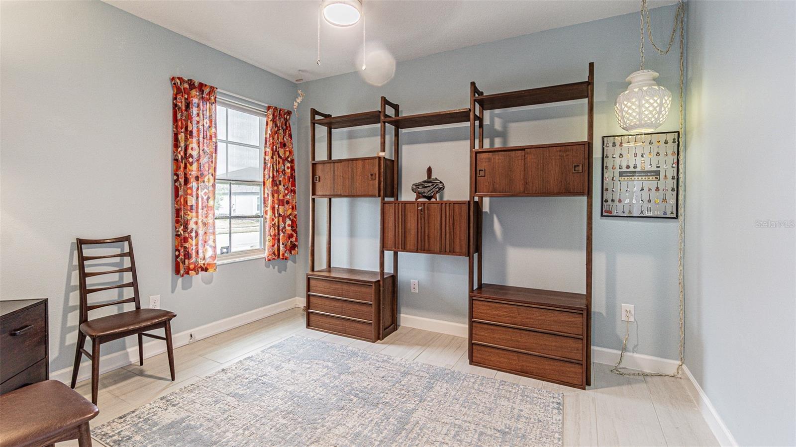 Flex room set up as a home office/den