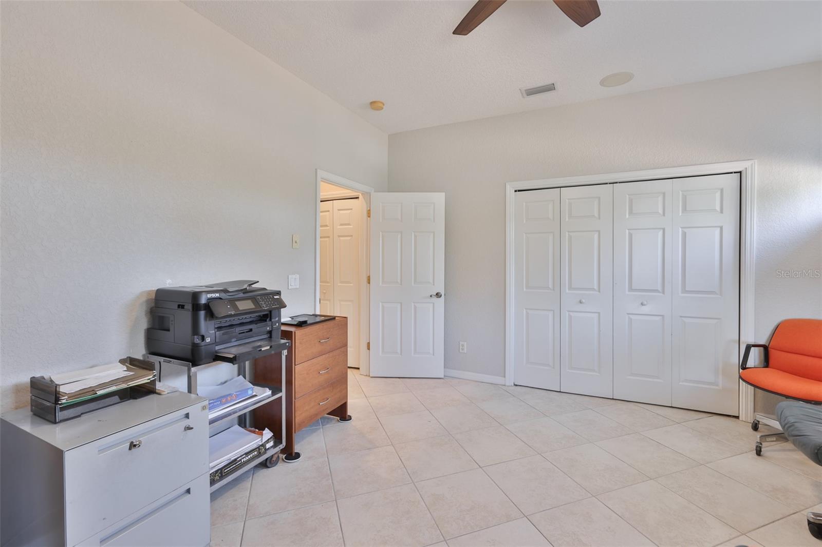 This room boasts of a large built in wall closet and matching tile flooring, as in the rest of the condo..