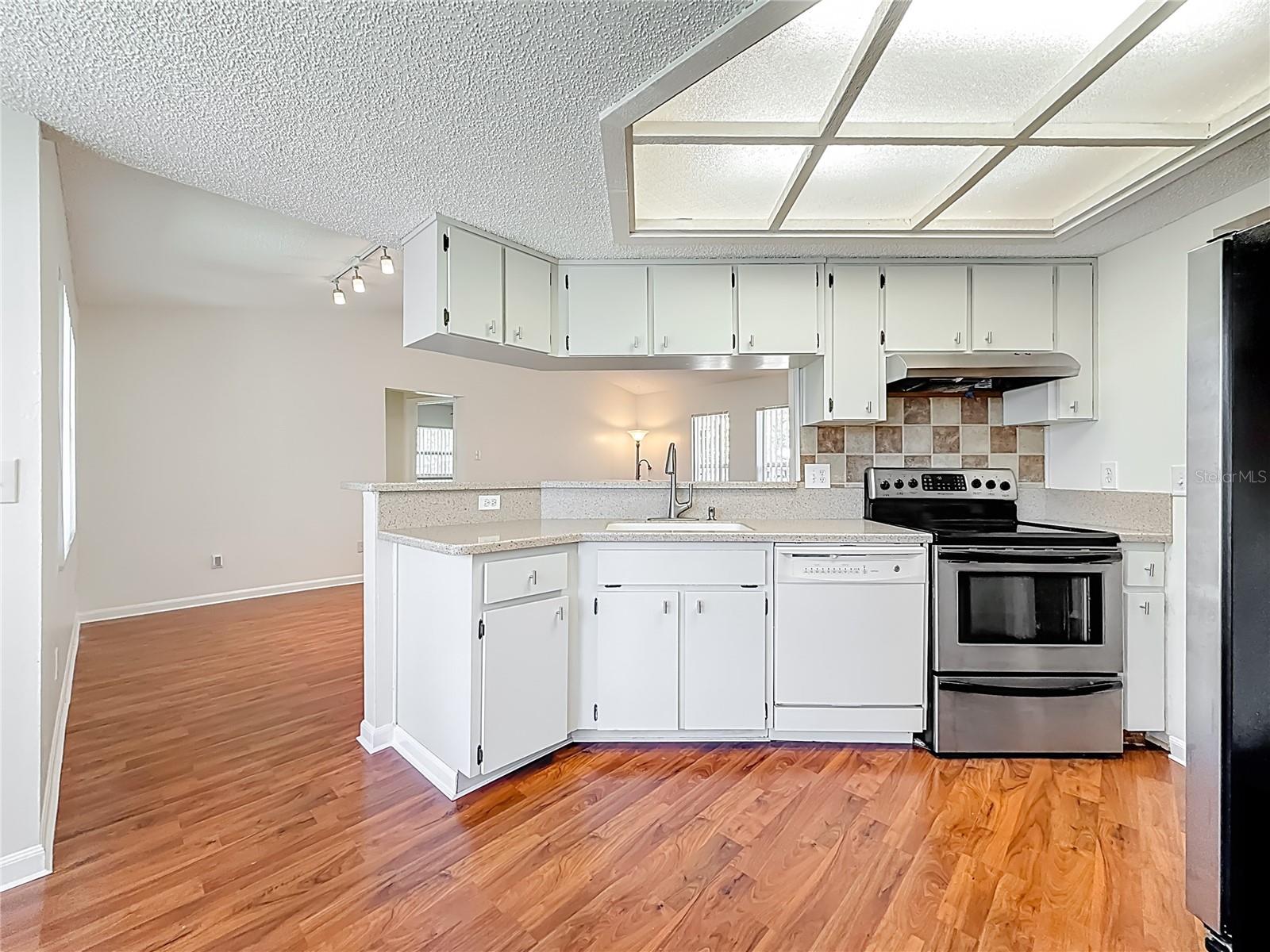 Kitchen - Dining Room - Living Room