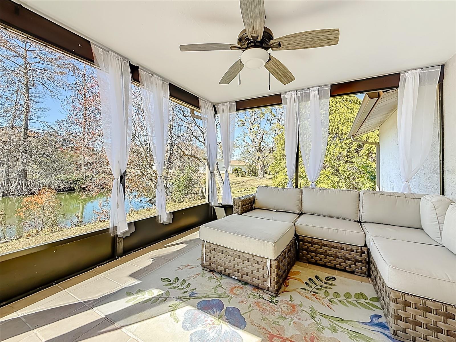 Screened Lanai Overlooking Lake and Rear Green Space