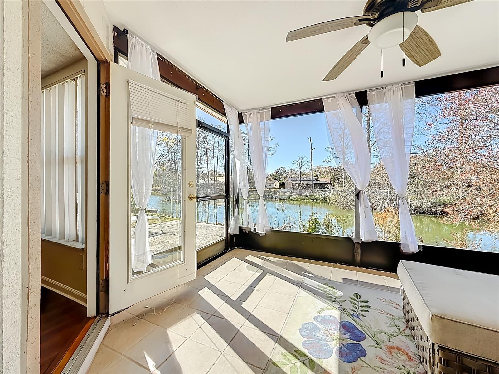 Screened Lanai Overlooking Lake and Rear Green Space
