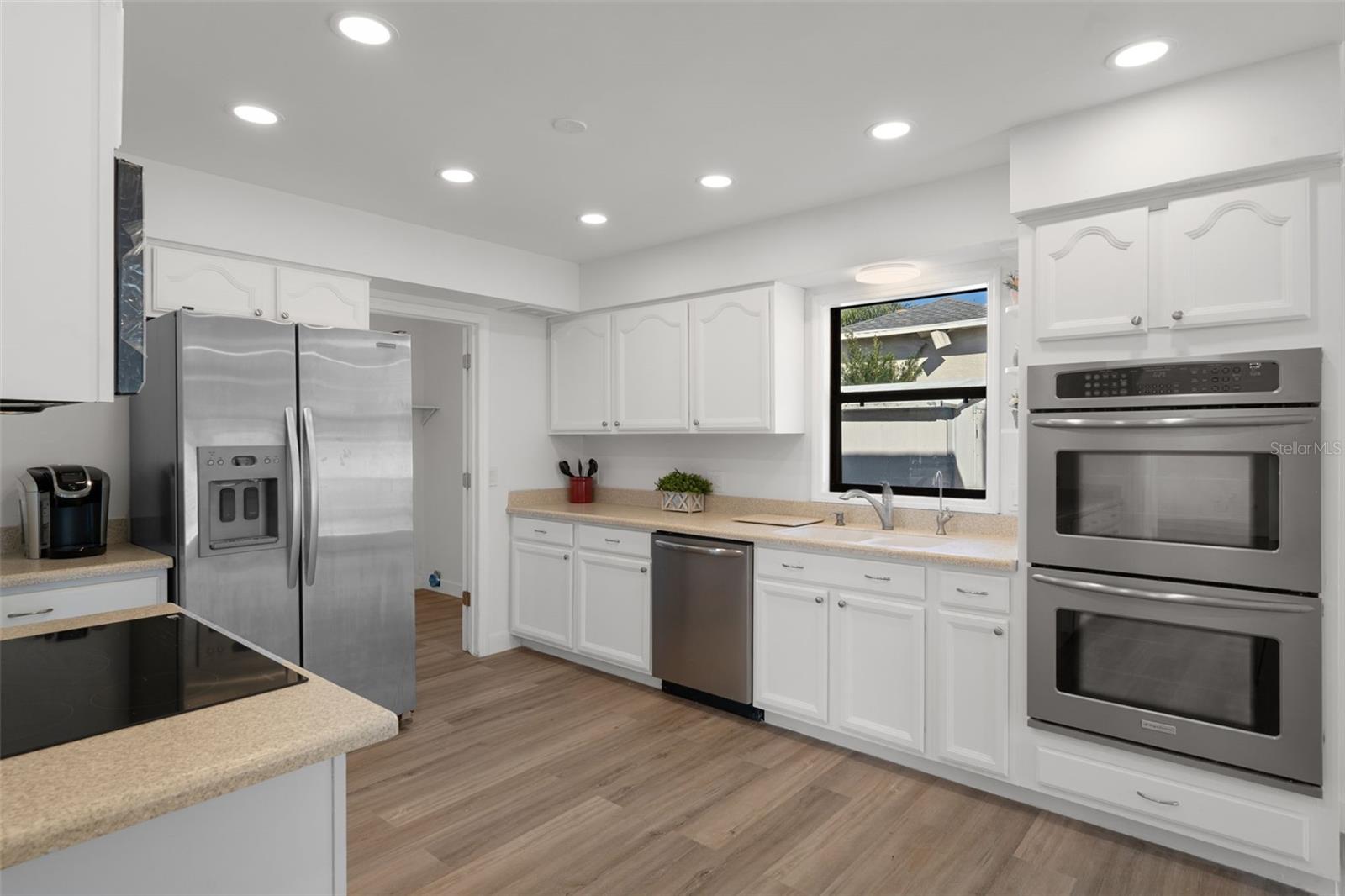 Wow, what a gorgeous Kitchen. Notice the New LED recessed lighting