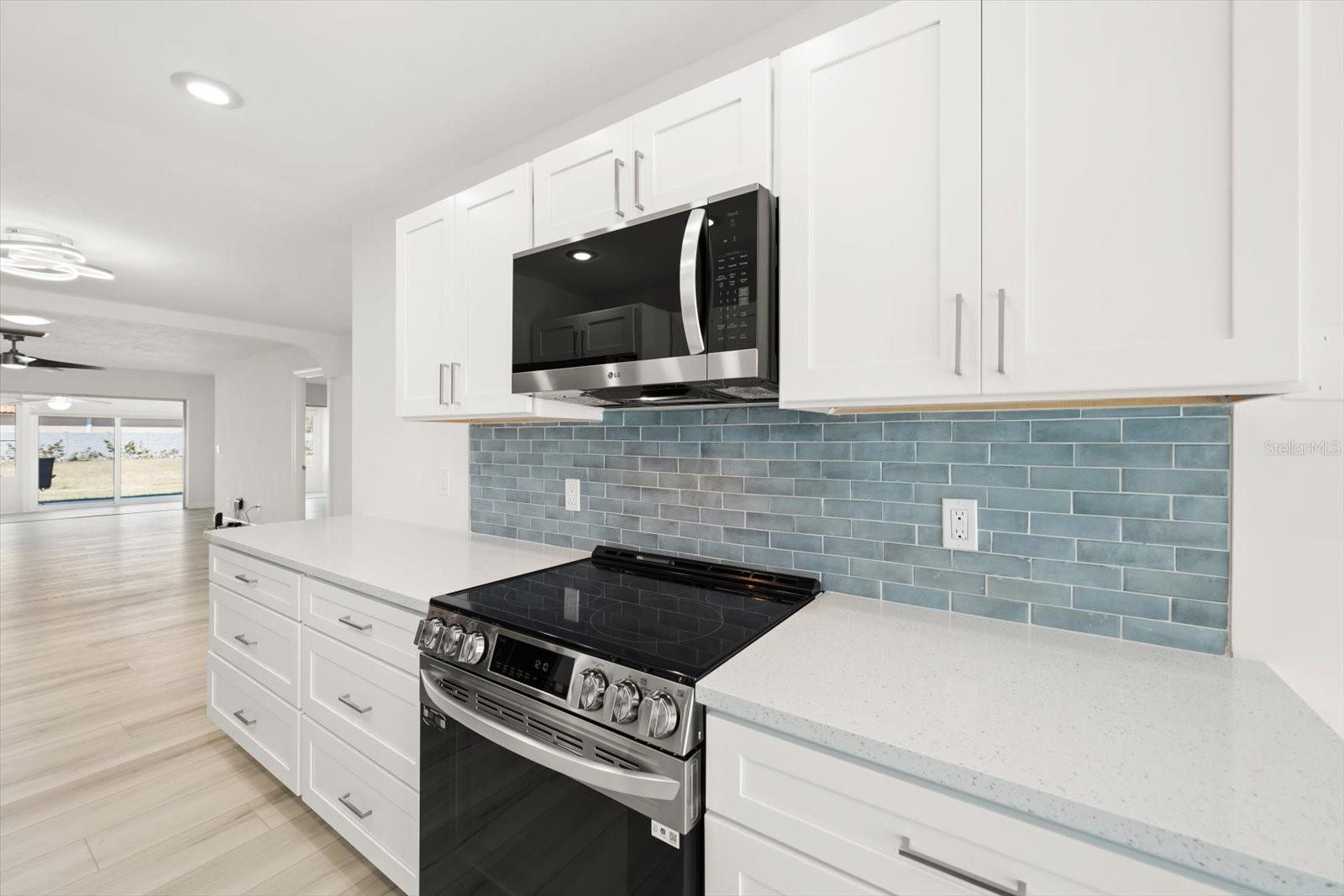 All new kitchen with plenty of counter space - opens into the great room