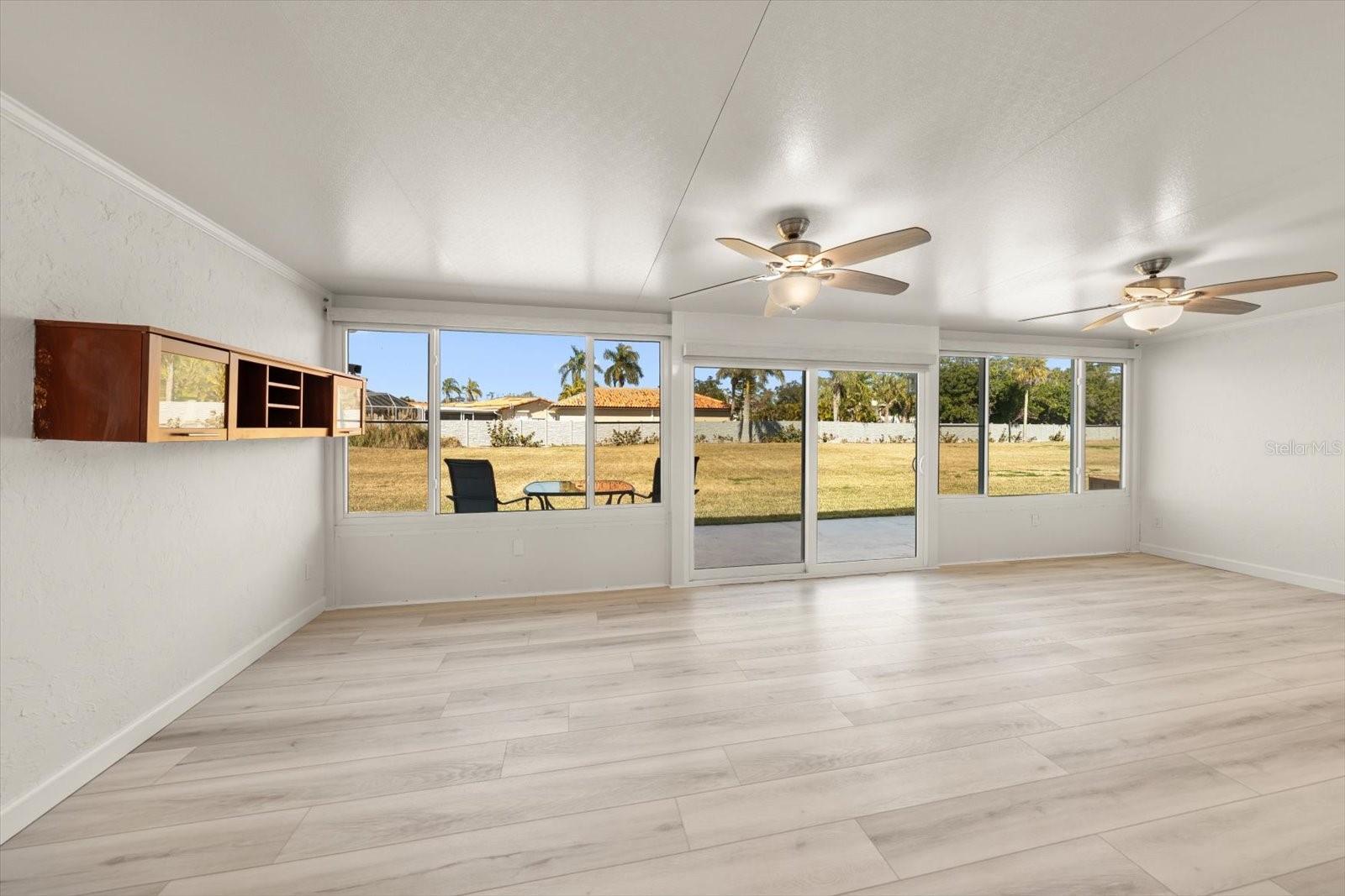 Florida room opens out to great greenspace