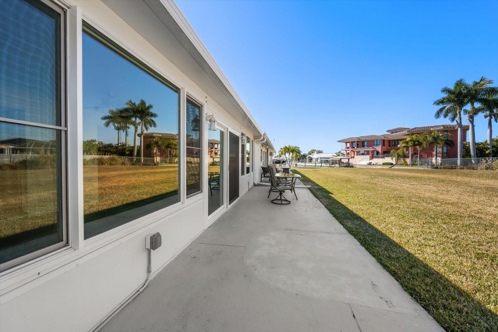 Rear patio with views of the waterway and amazing sunsets