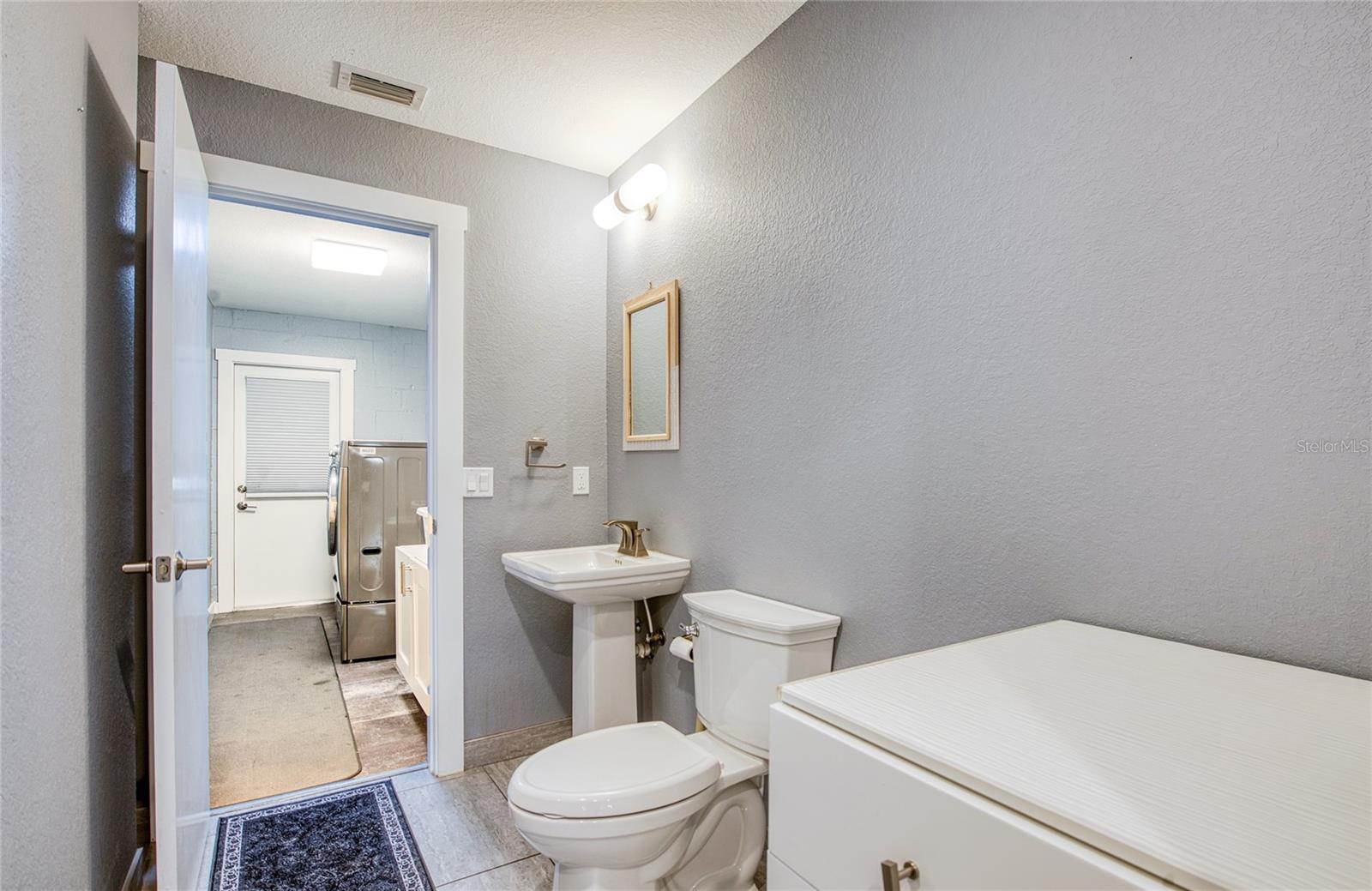 Half Bath to Inside Utility