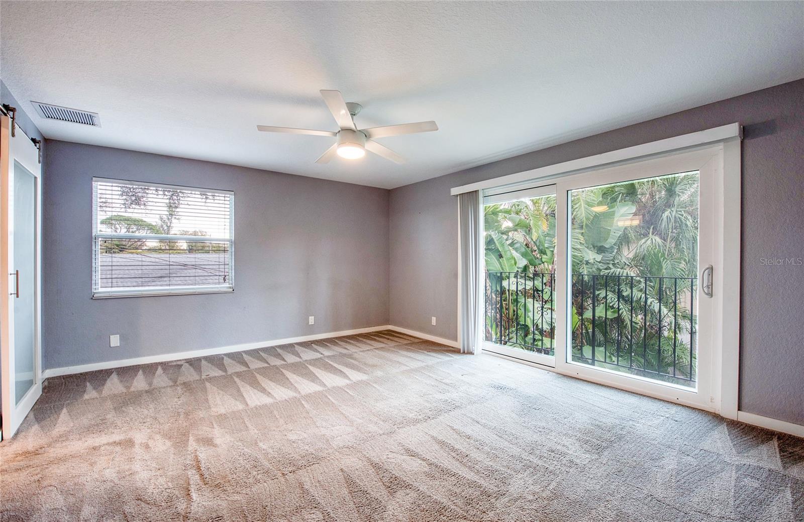 Second Floor Primary Bedroom with rear yard view