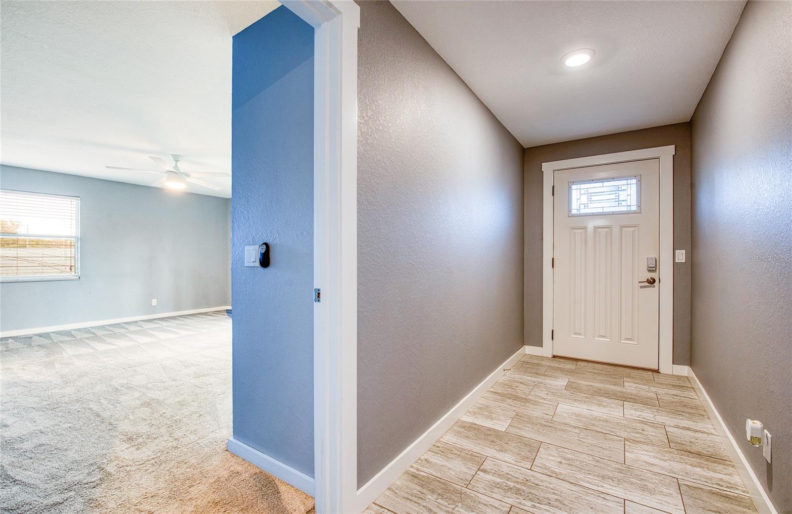 Second Floor Hallway with exterior door and private access to rear yard