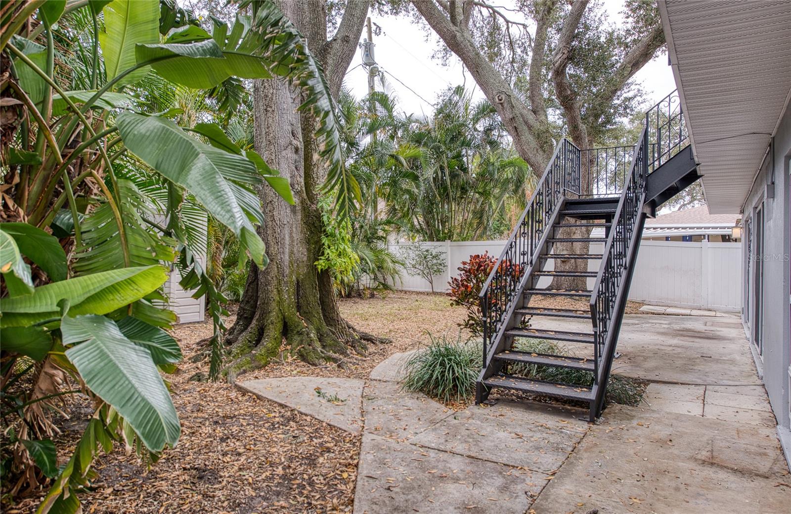 Private Rear Yard with access to Pool Area and Second Floor exterior door