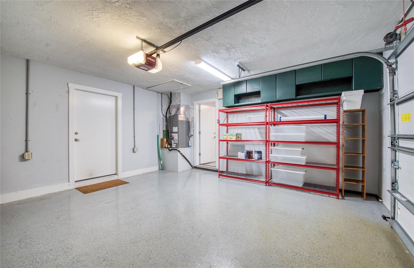 Garage with access to Living Area and Utility Room