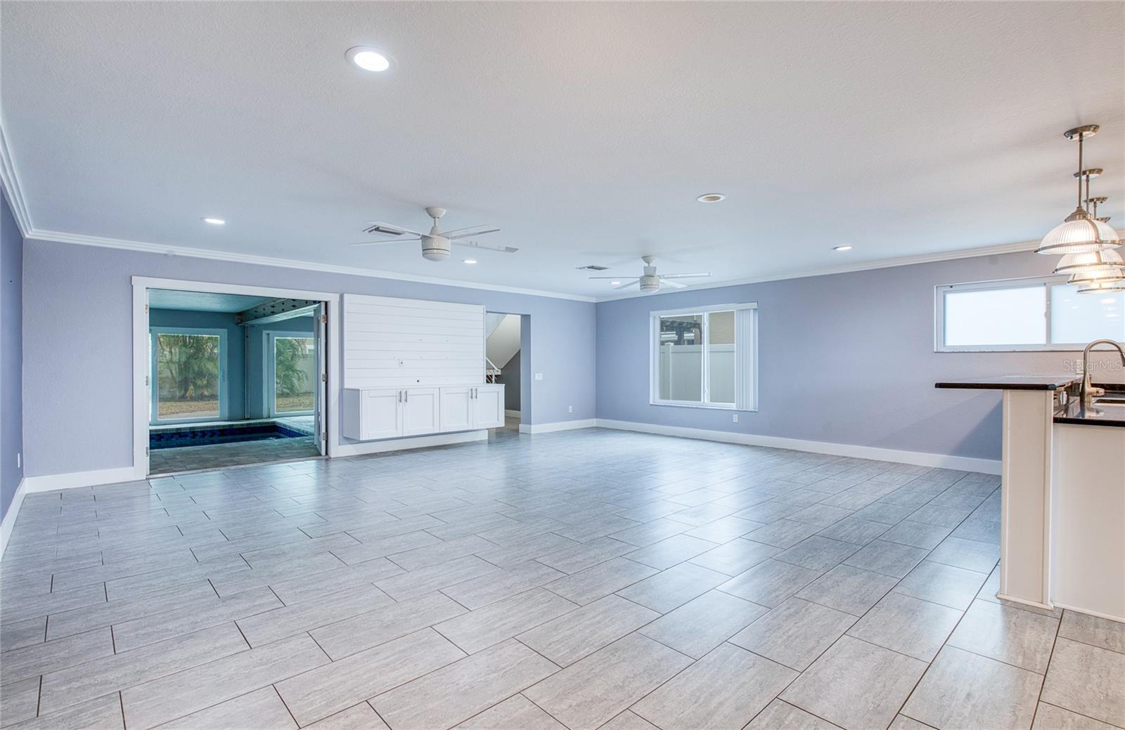 Living Room - French Doors to Pool Area Open