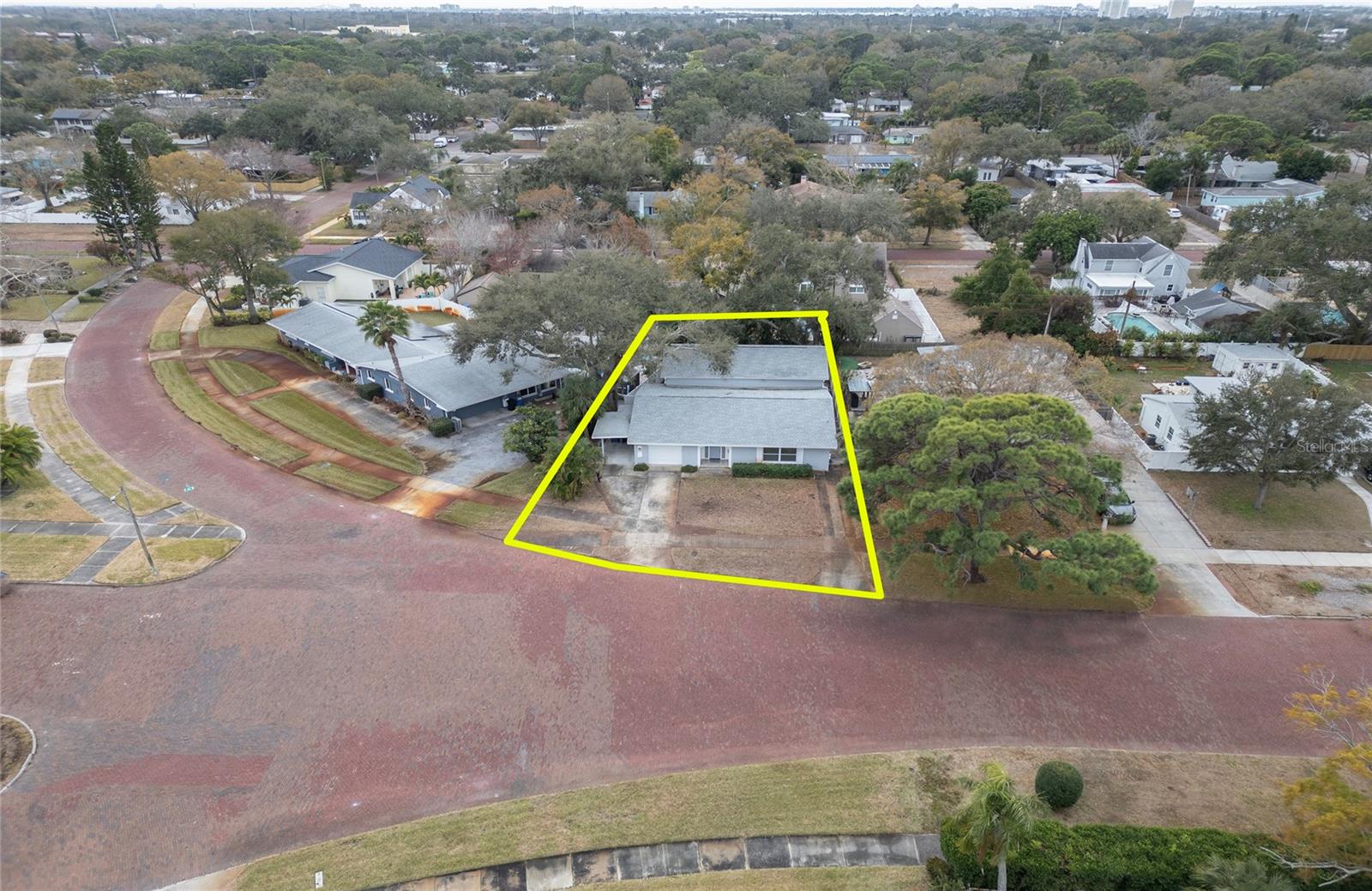 Aerial View of Two Story home with wide brick streets
