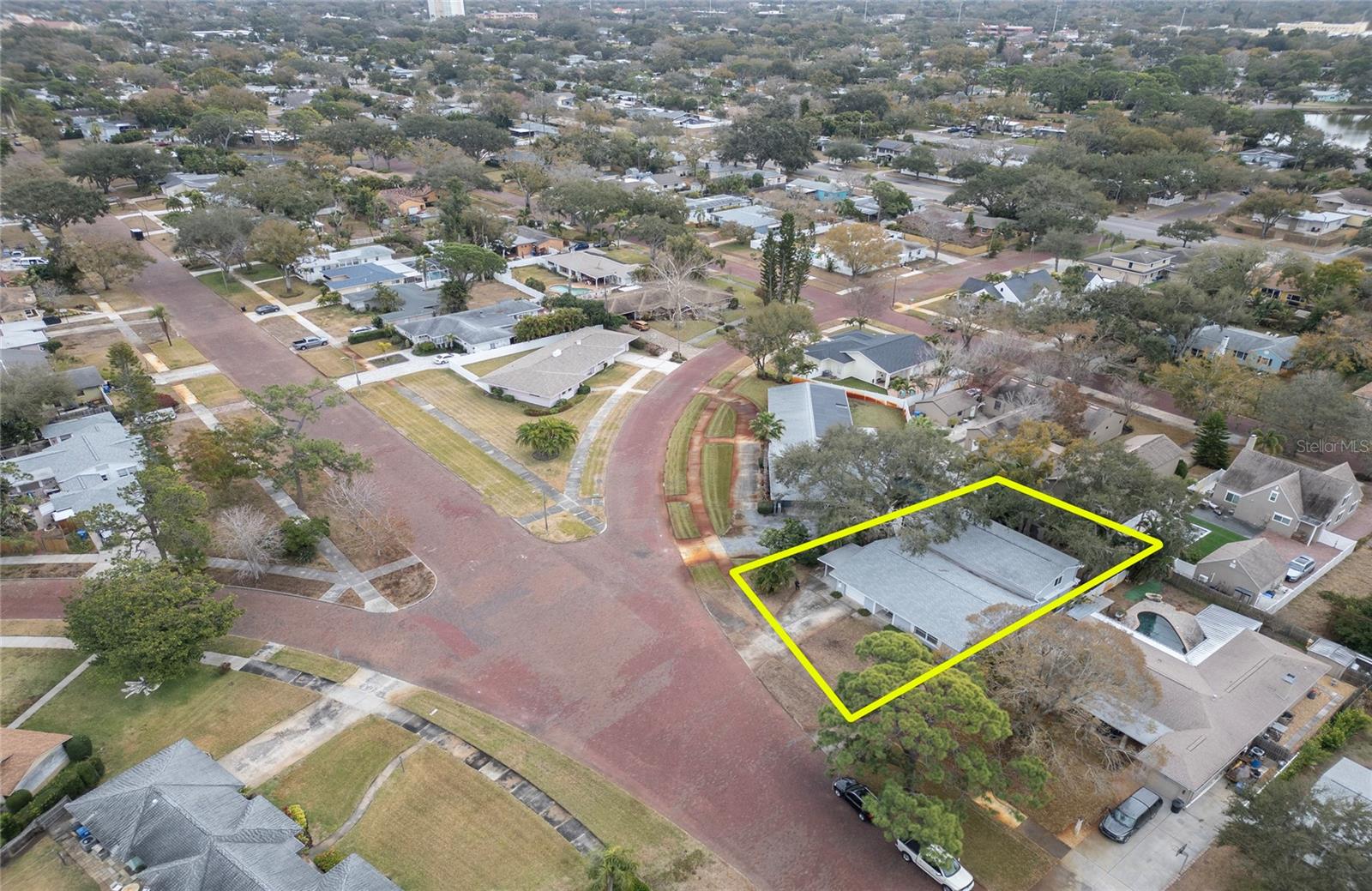 Aerial View of Two Story home with wide brick streets