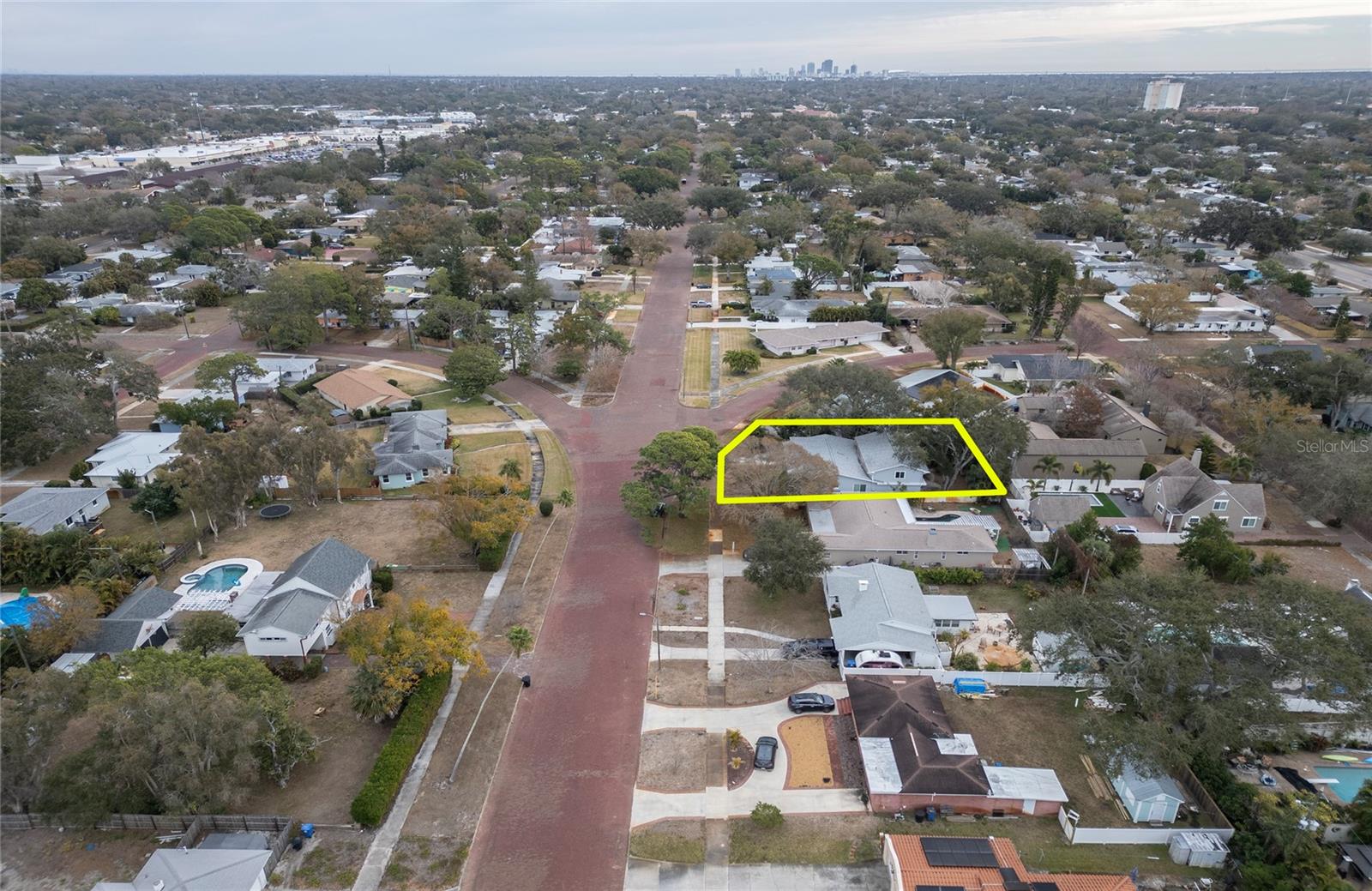 Aerial View of Two Story home with wide brick streets