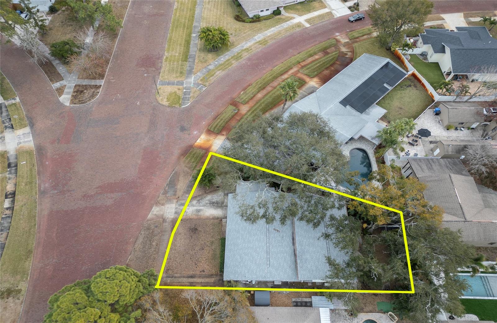 Aerial View of Two Story home with wide brick streets