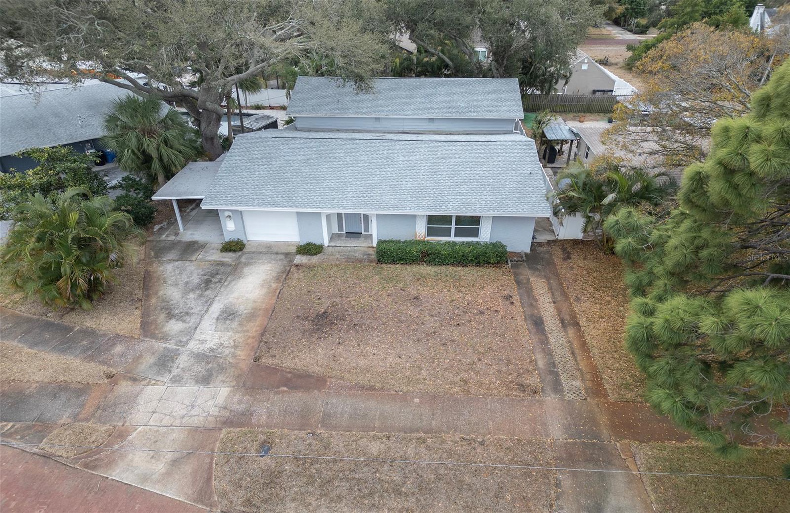 Aerial View of Two Story home with wide brick streets