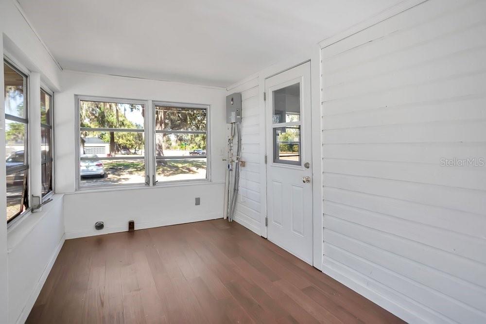 Laundry area on enclosed back porch