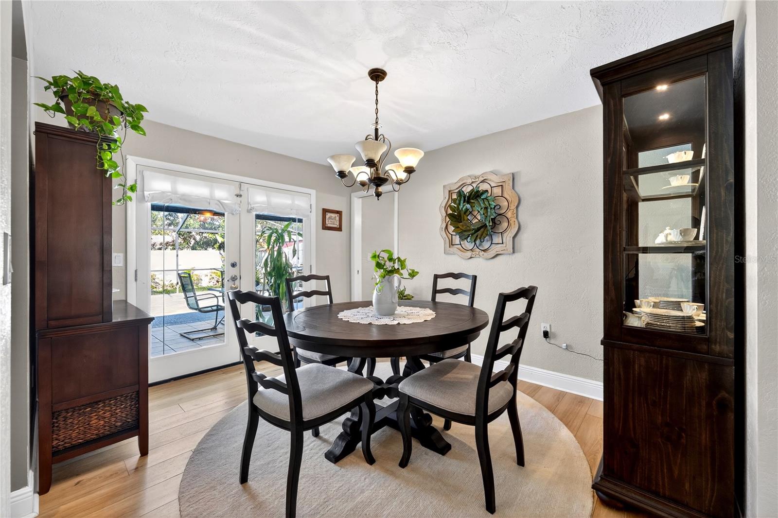Dining room with primary bedroom in back corner