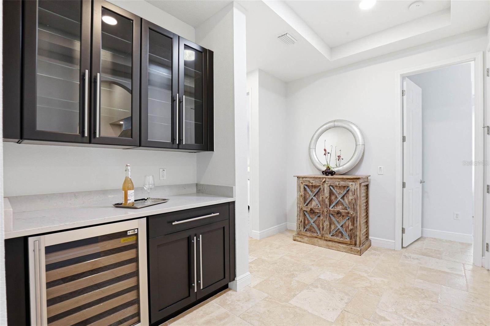 Dry Bar Featuring: Win Fridge & Upper & Lower Cabinets