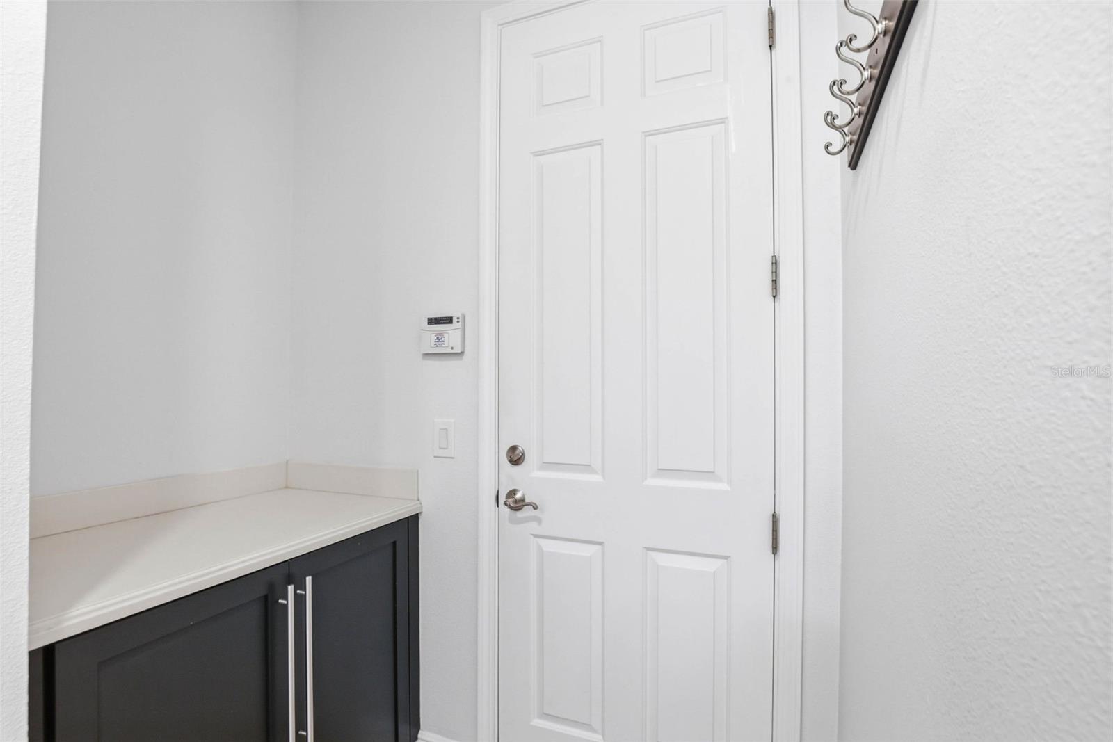 Storage Area/Entryway To Garage