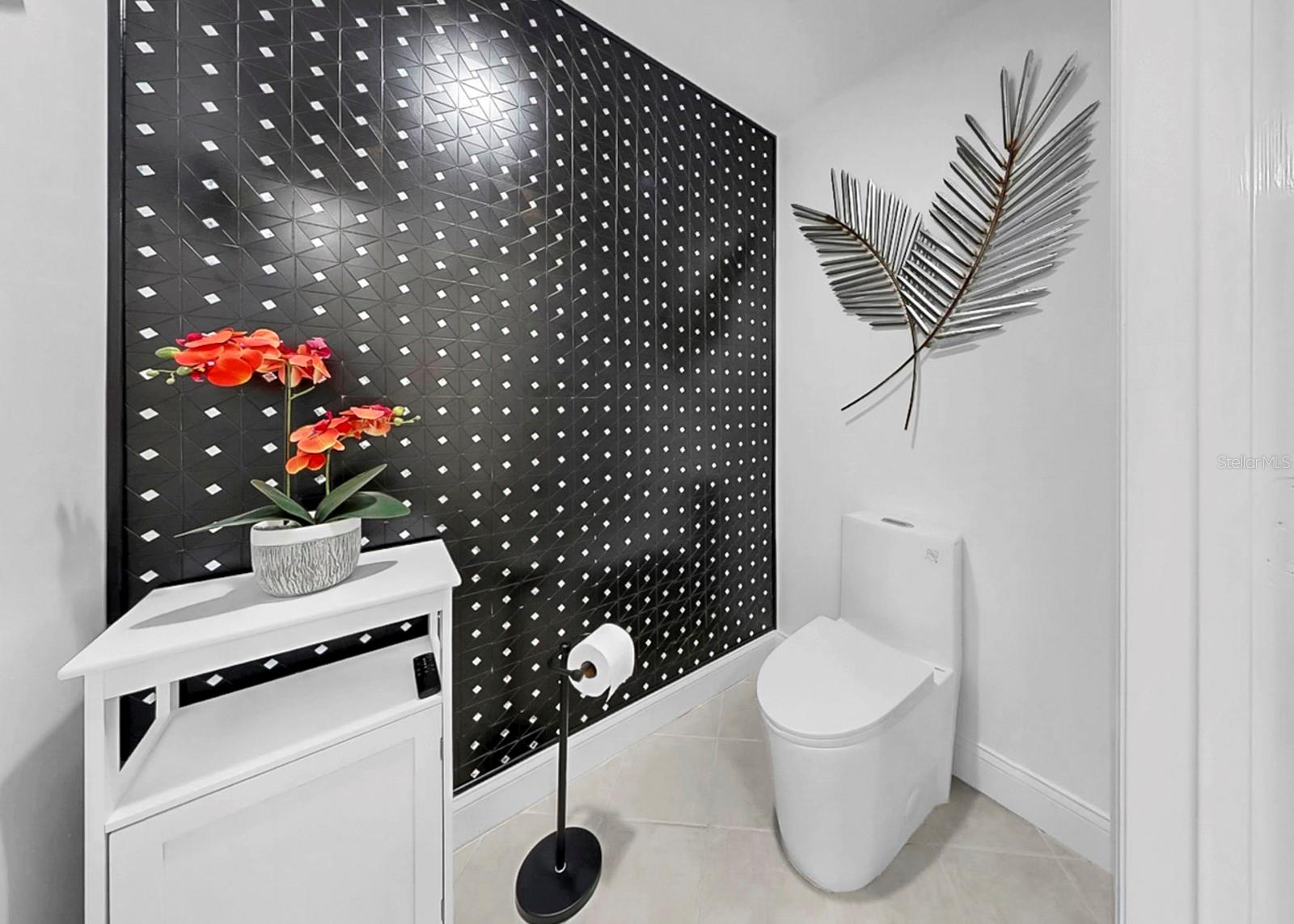 Primary water closet with updated wall tile