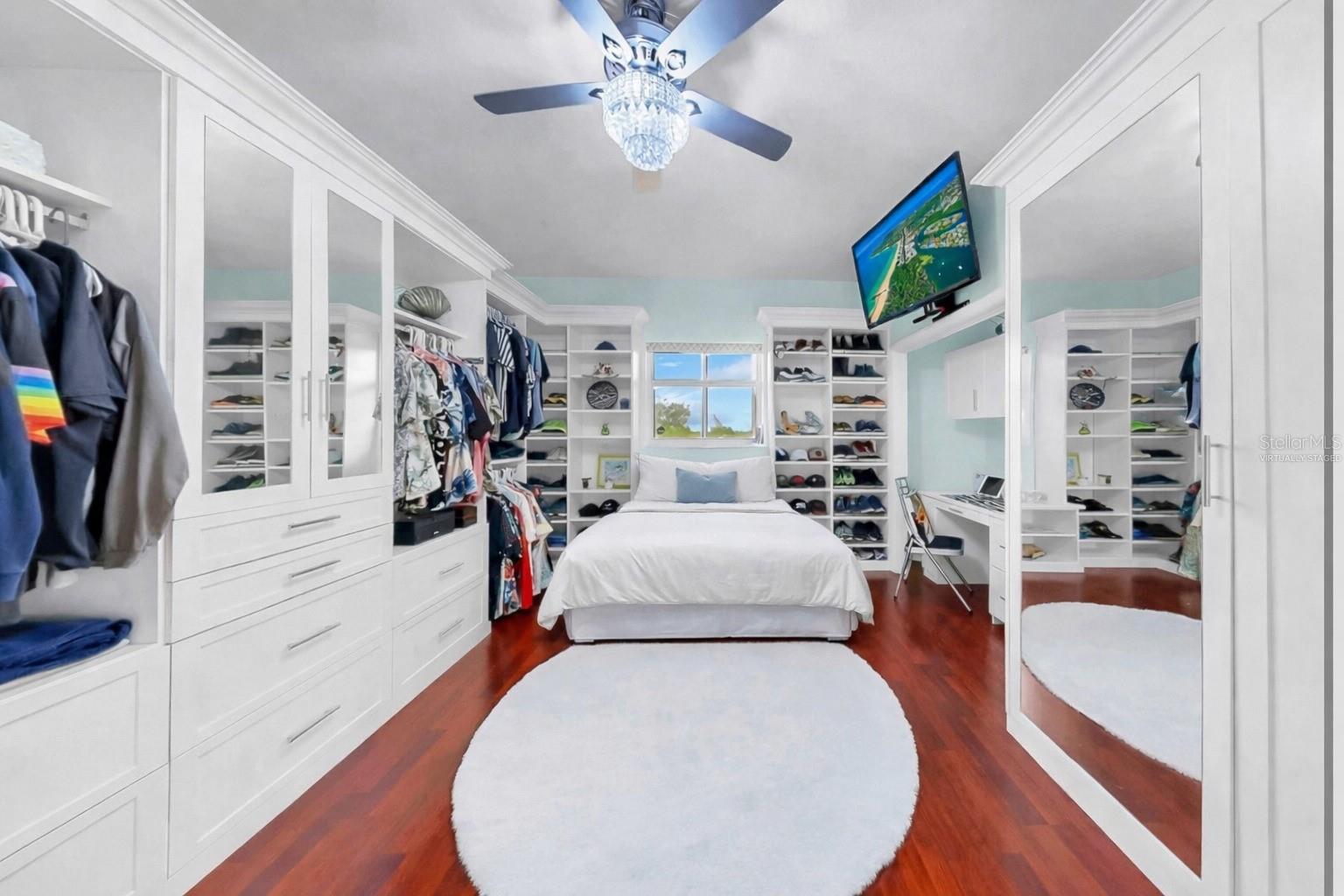 Virtually staged bed in dressing room