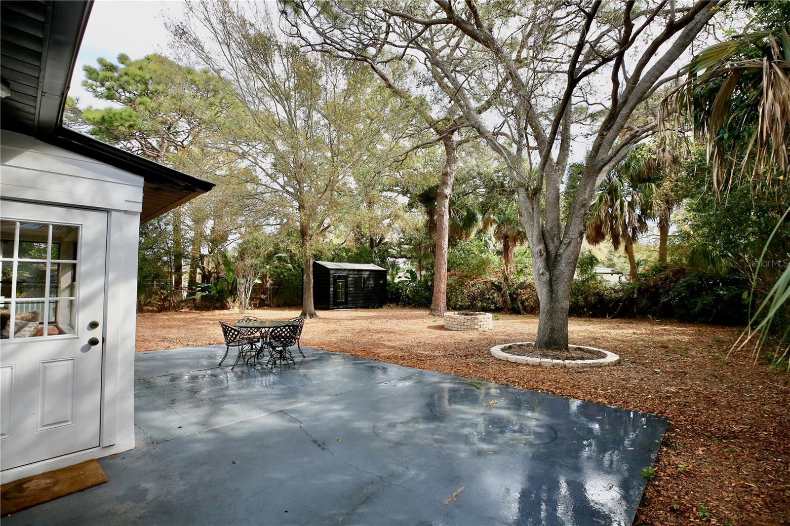 SIDE DOOR OUT TO THE BACKYARD.