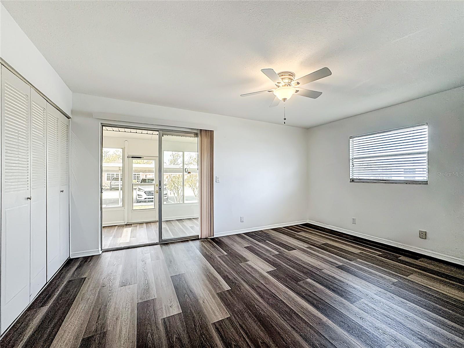 BEDROOM, SLIDERS TO FLORIDA ROOM