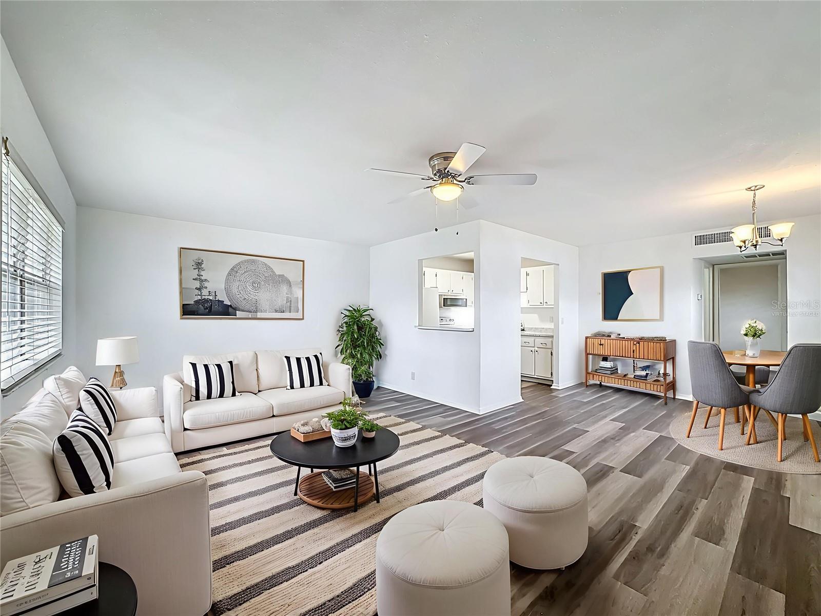 Virtually staged. Living/Dining. NEW LVP FLOORS