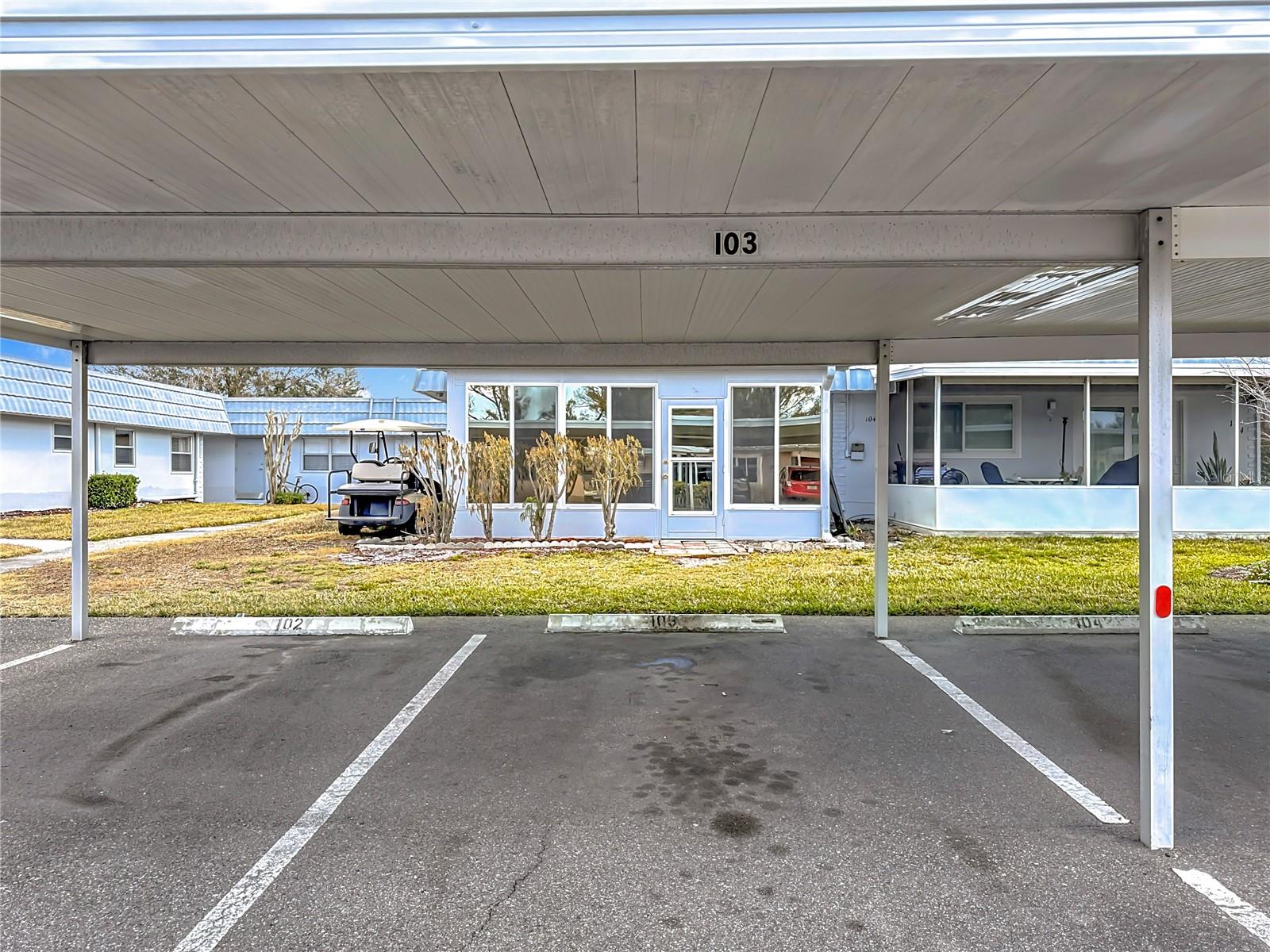 Covered parking in front of unit