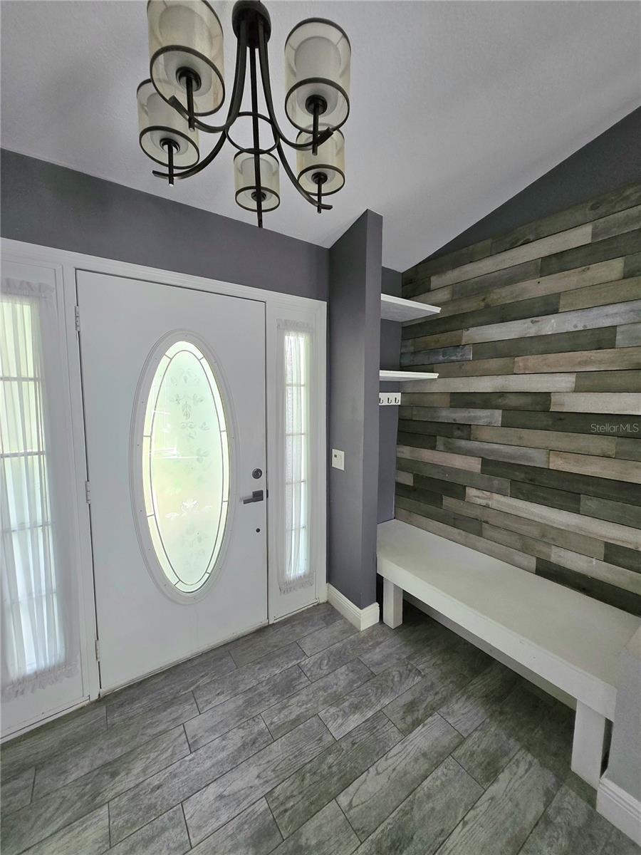Foyer with custom wall.