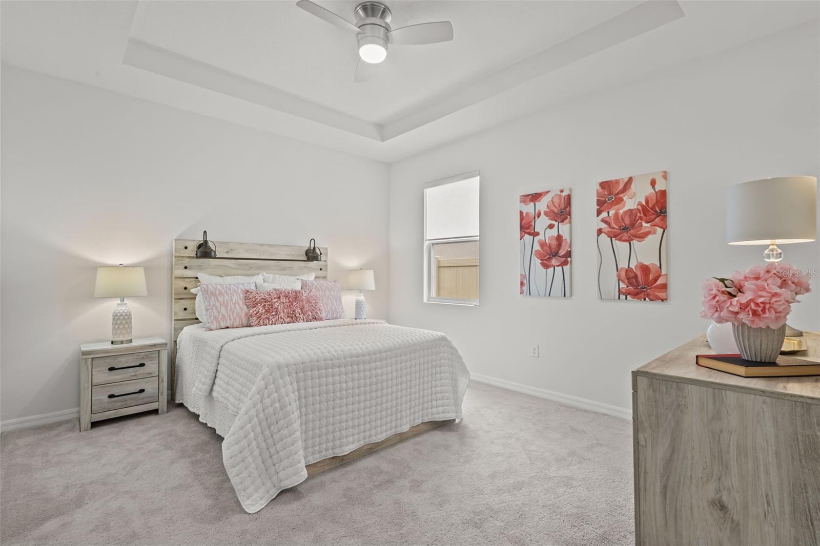 Spacious bedroom within the multigenerational suite offering privacy and comfort.