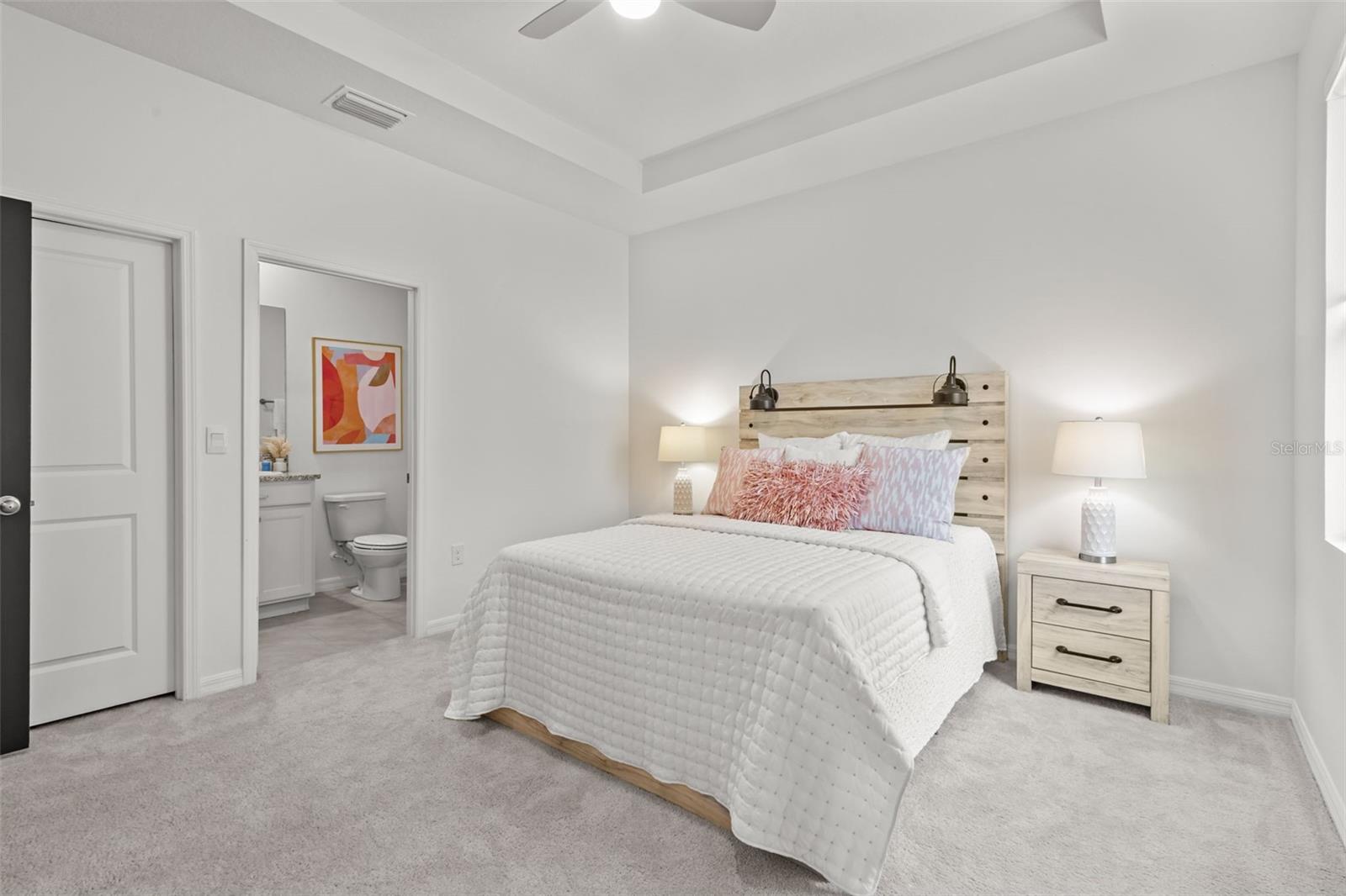 Spacious bedroom within the multigenerational suite offering privacy and comfort.