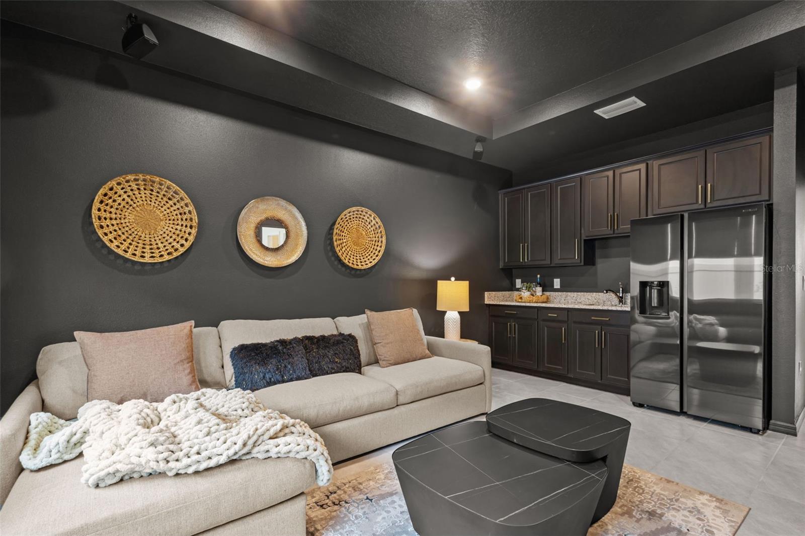 Multigenerational suite featuring its own living area and convenient kitchenette—perfect for extended family, guests, or independent living.