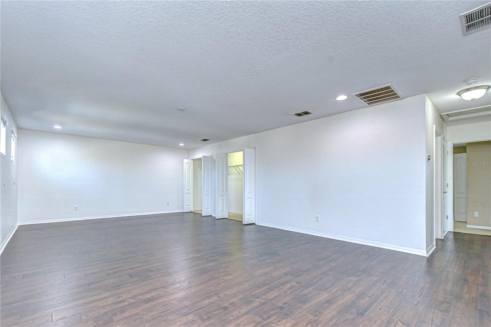 Tons of extra storage and beautiful wood look laminate floors!