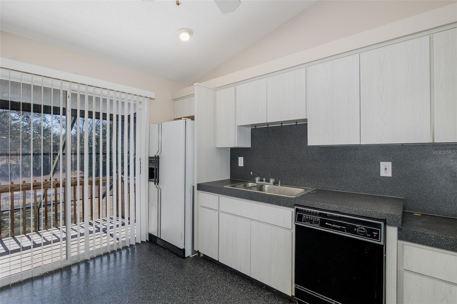 Second level, full-kitchen with balcony.