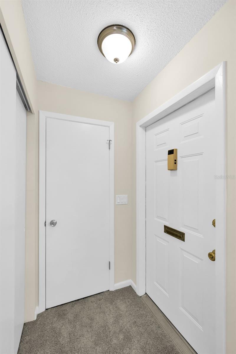 Front door, and half bath! So convenient for a one bedroom!