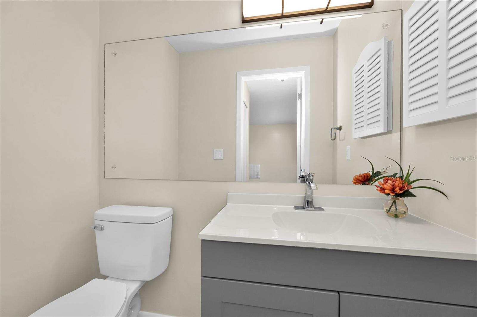 The half bath near the front door!