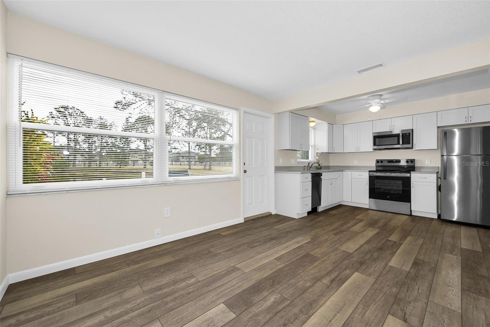 Beautiful fresh new flooring, paint and stainless steel appliances!