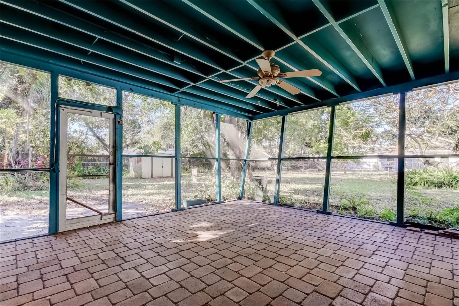 Covered Screened In Porch with Pavers is SO NICE!