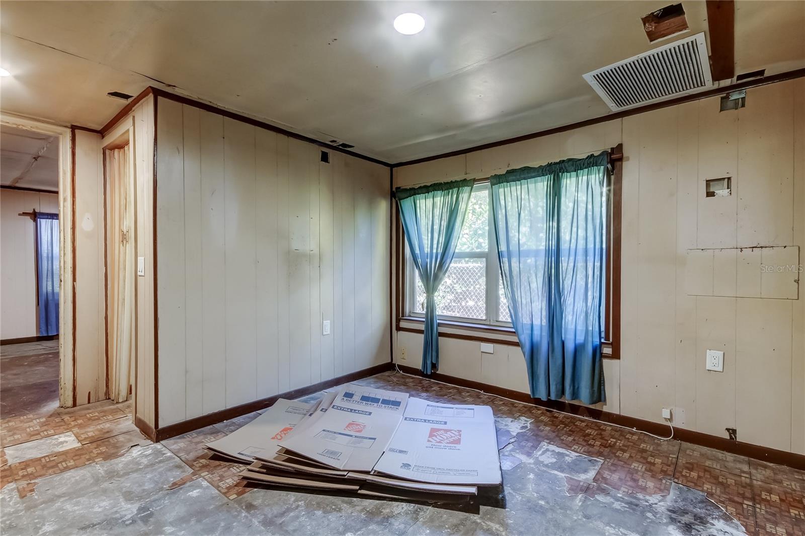 Bonus Room - First Room off of the Family Room - Enclosed Area has a toilet and small sink