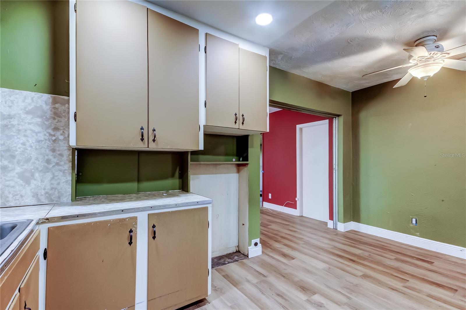 Kitchen - Dining Area to the Right and Family Room Beyond