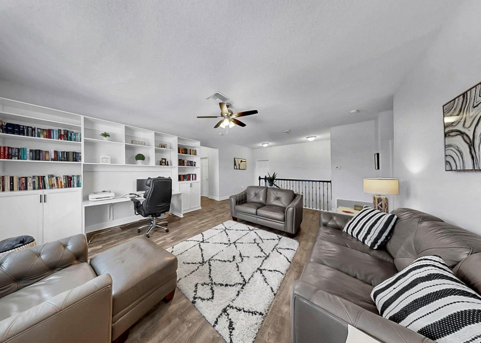 Loft with built-in shelving, storage and desk - perfect for homework or working from home