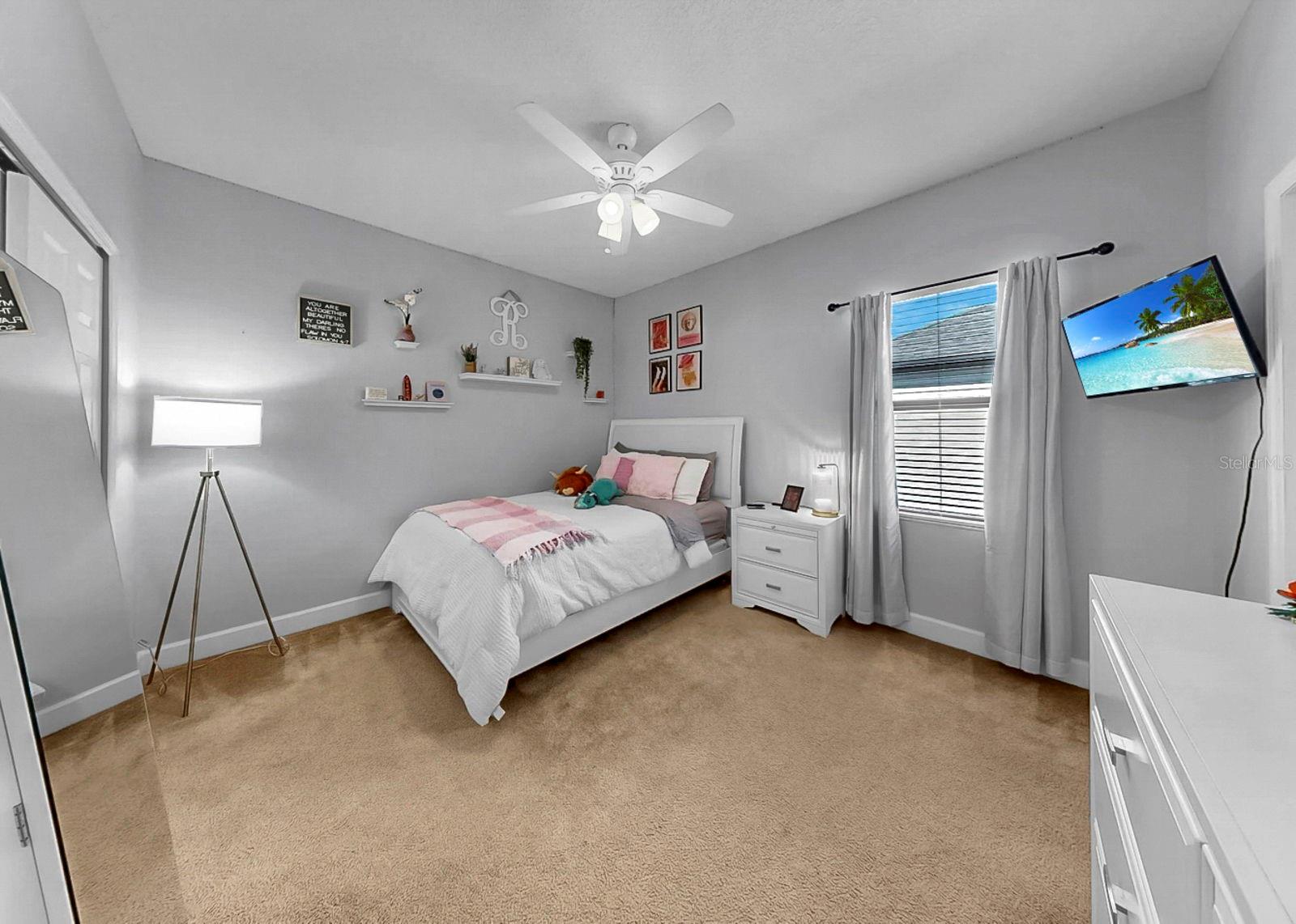 Upstairs bedroom 2 with shared jack-and-jill bathroom