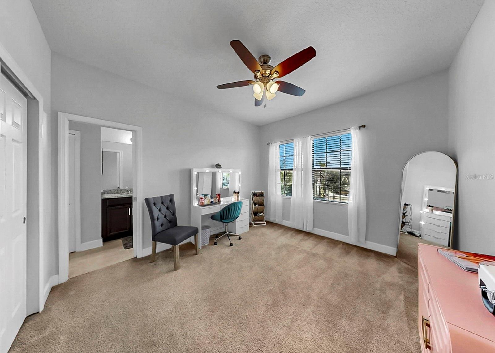 Upstairs bedroom 3, currently used as a dressing room, with shared jack-and-jill bathroom