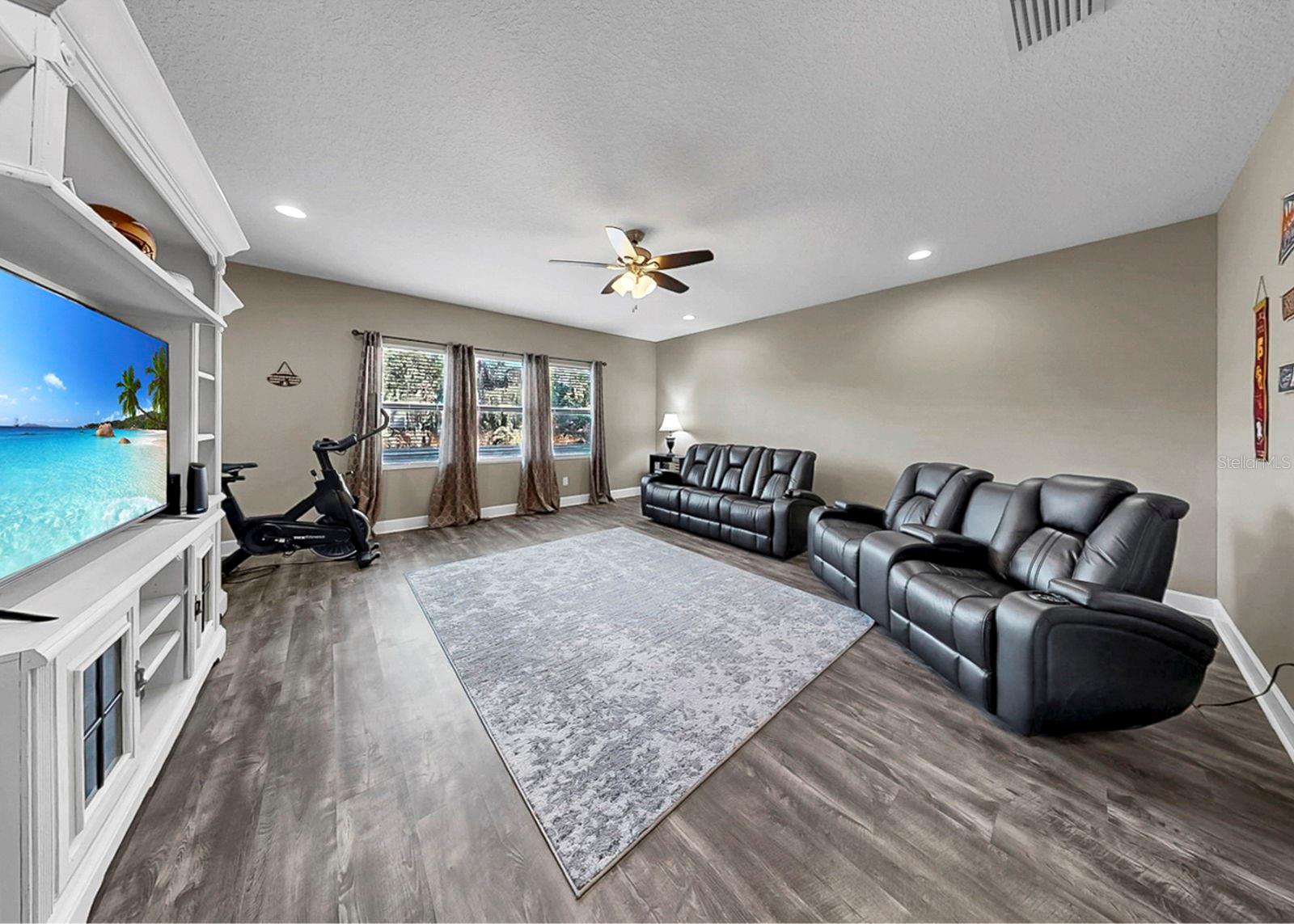 Upstairs bonus room - a perfect movie room, teen hangout, secondary living room for multi-generational living...